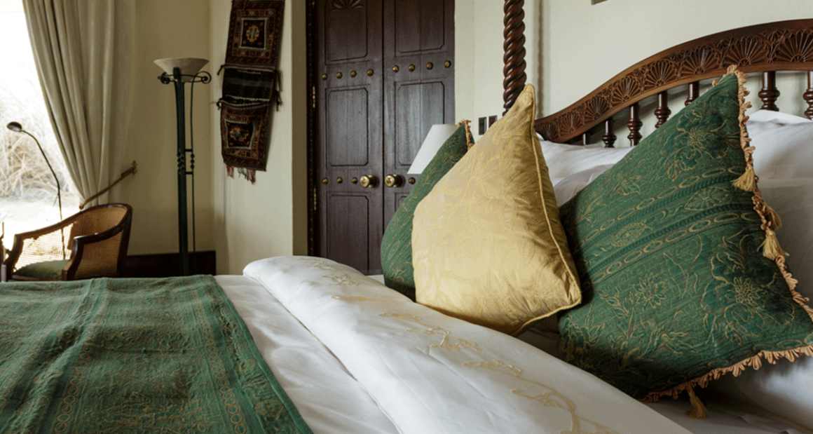 A sumptuous super-king size bed. Photograph by Walter Shintani.