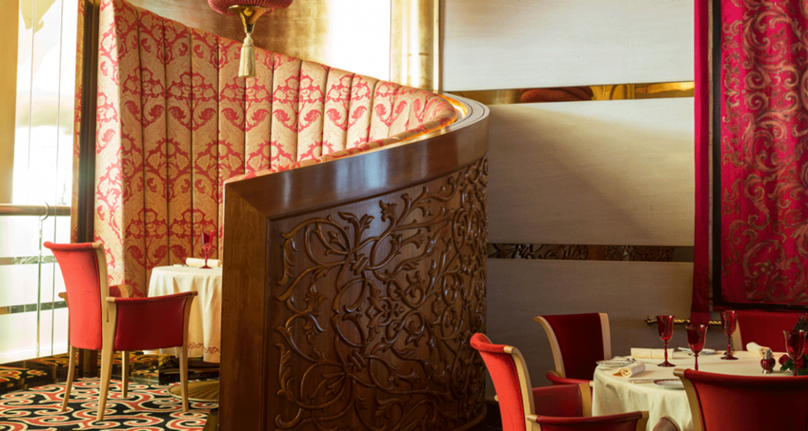 A sumptuous banquette inside the Arabian restaurant Al Iwan. Photograph by Walter Shintani.