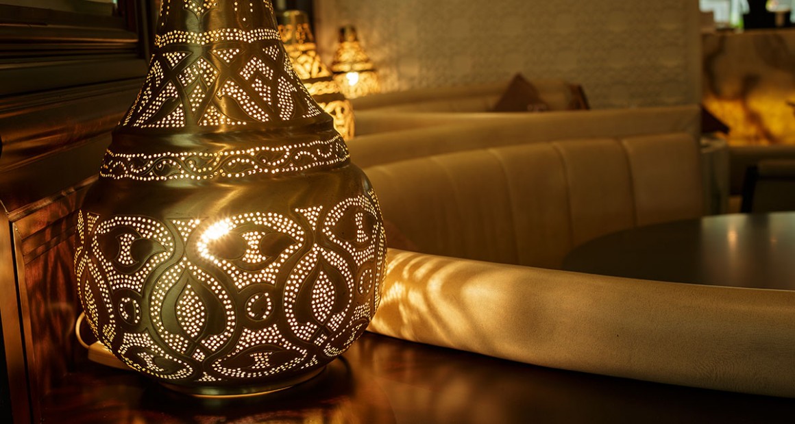 Lanterns cast a golden glow. Photograph by Walter Shintani.
