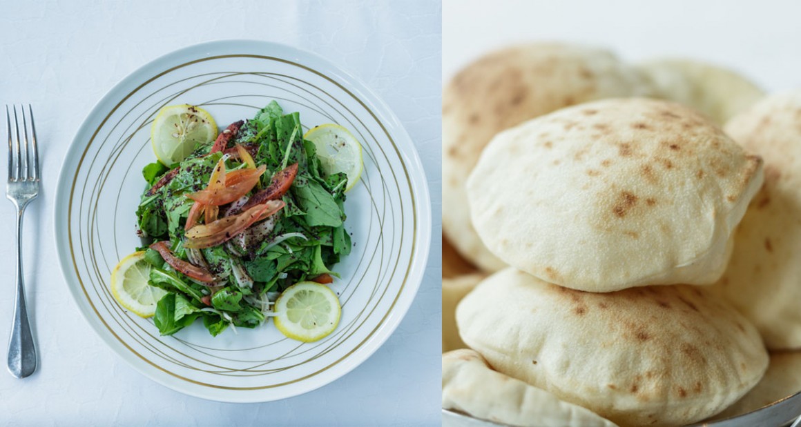 A pile of flatbreads and arugula salad with onions, tomatoes, and olive oil. Photograph by Walter Shintani.