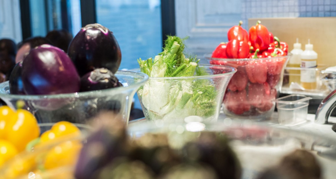 Bowls of fresh eggplant, fennel and peppers. Photograph by Walter Shintani.